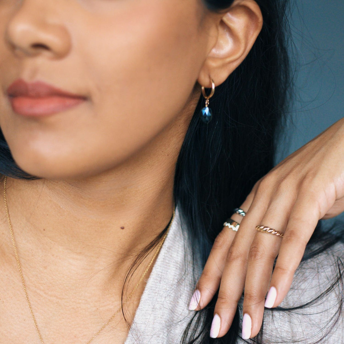 14k gold huggie earrings with onyx stone