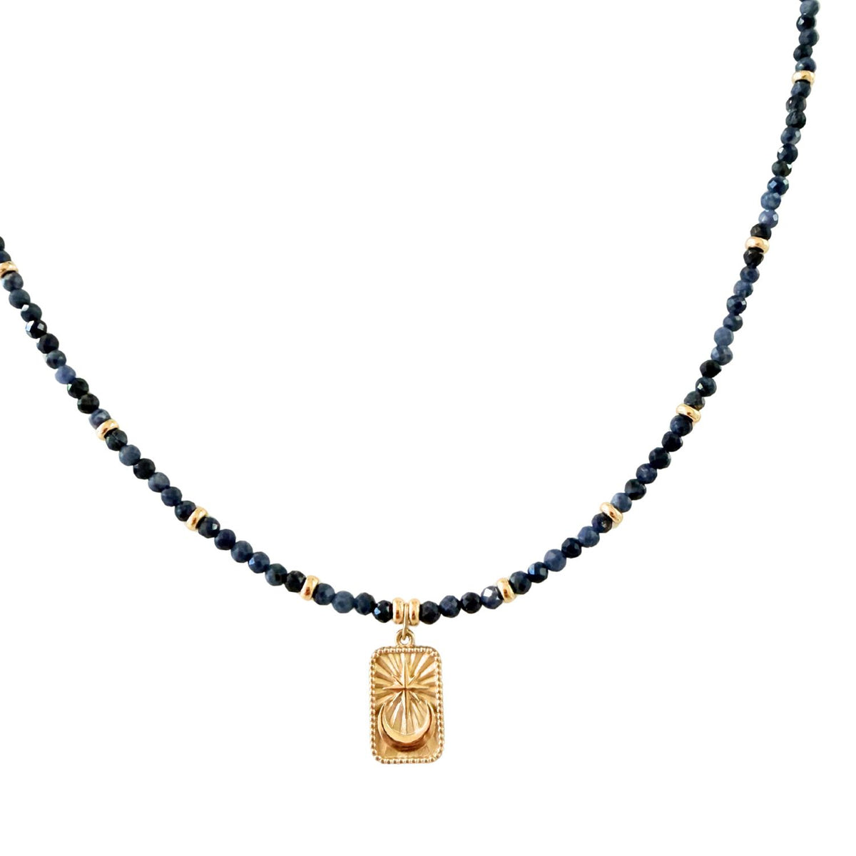 Necklace with blue beads and a gold star moon pendant on a white background