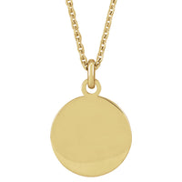 Gold pendant necklace on a white background