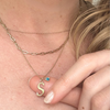 14k gold letter necklace with aquamarine stone