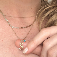 14k gold letter necklace with aquamarine stone