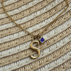 14k gold letter necklace with sapphire gem