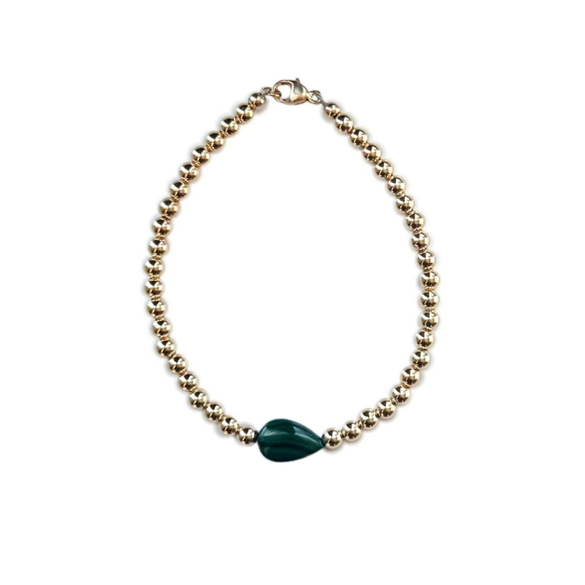 Gold Filled Bead Bracelet with a teardrop shaped malachite stone in the center set on a white background