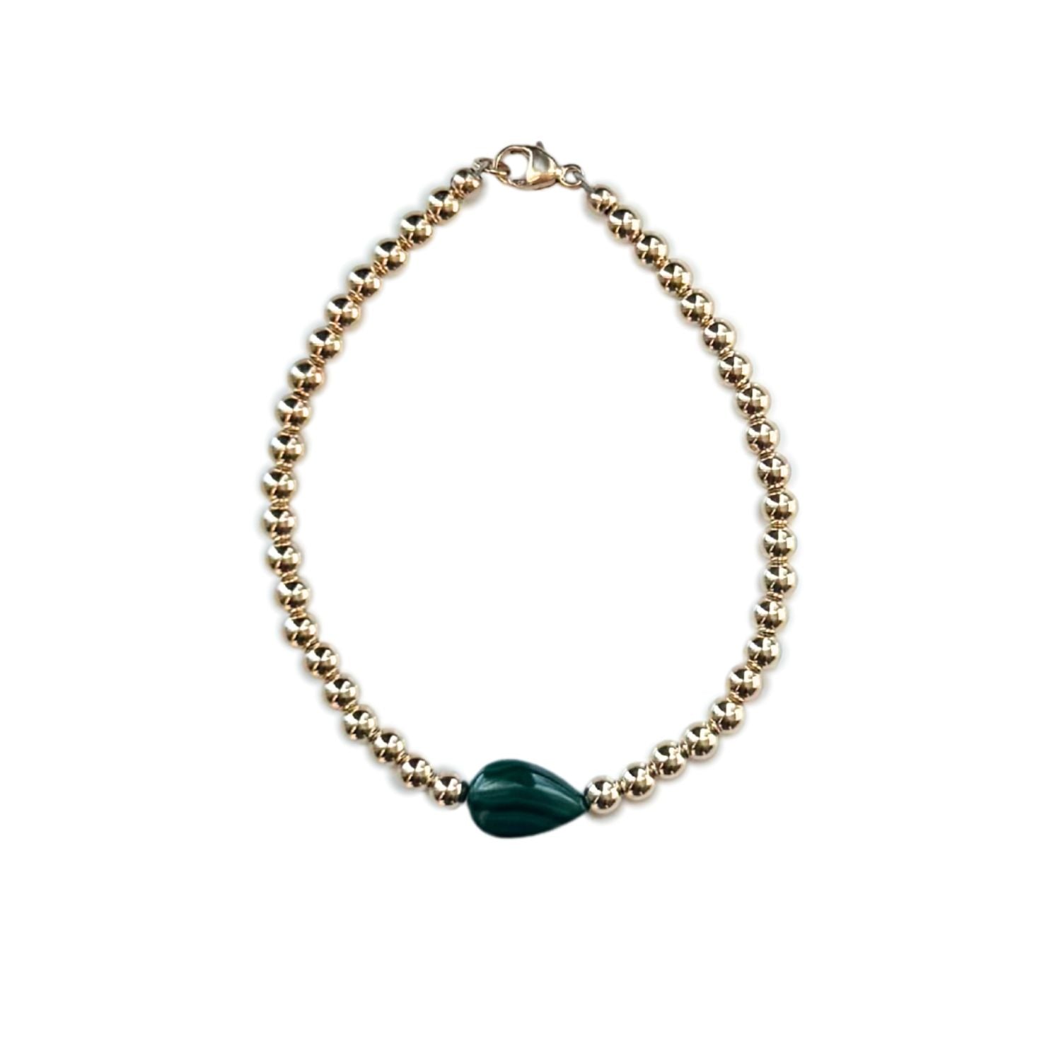 Gold Filled Bead Bracelet with a teardrop shaped malachite stone in the center set on a white background