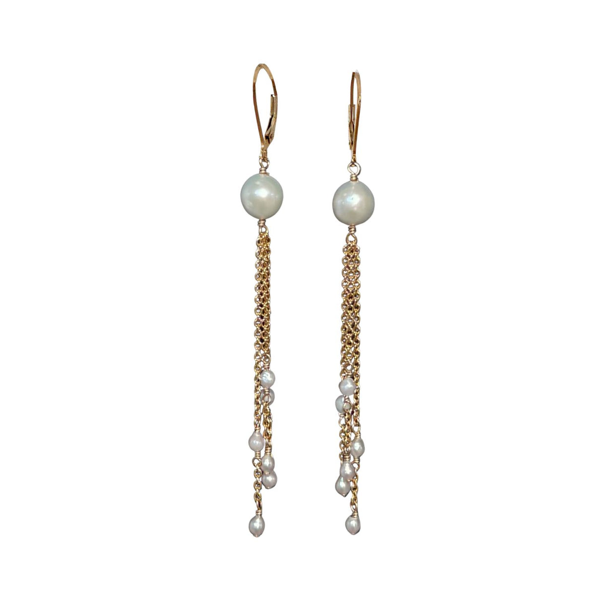 Pair of lever back pearl chain earrings on white background