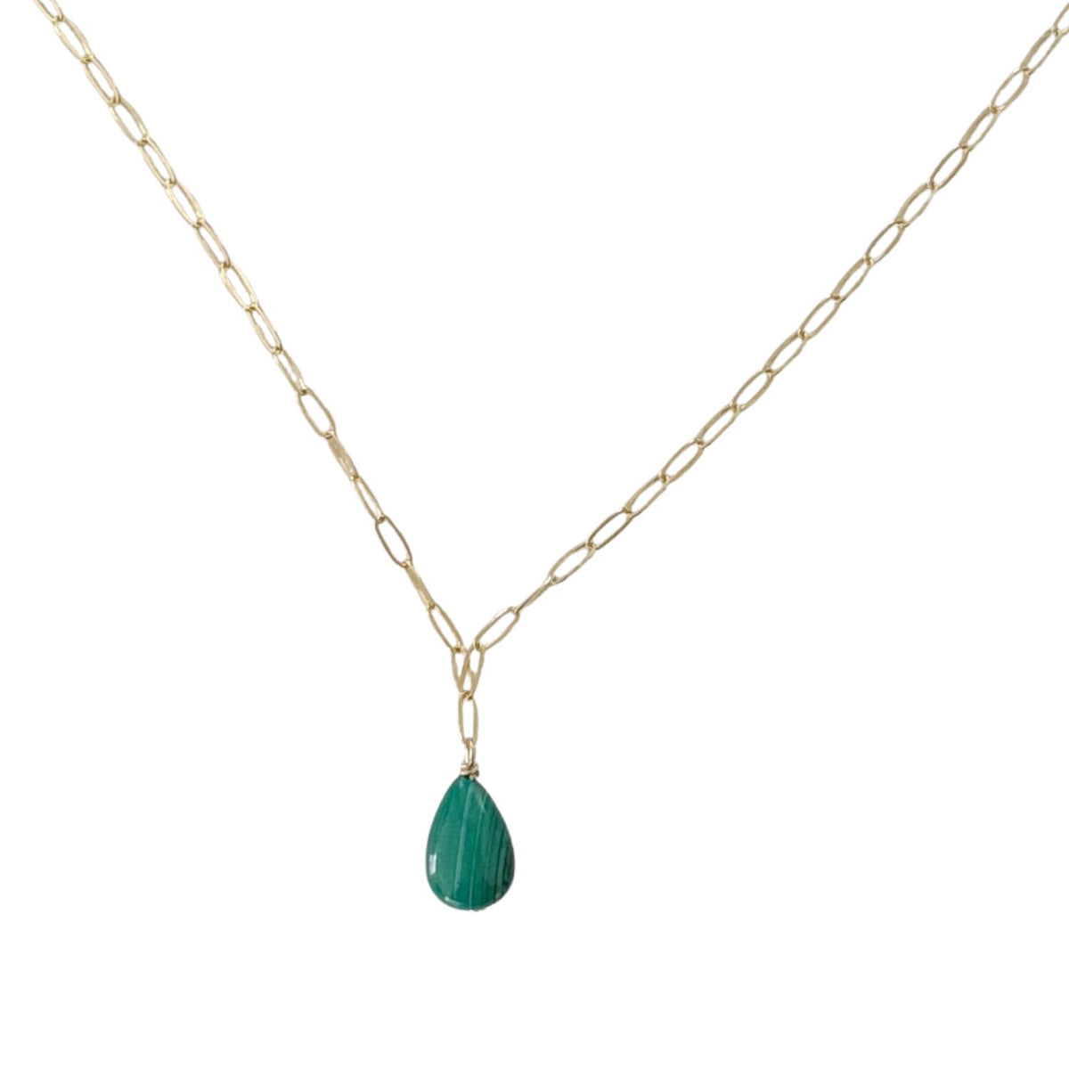 Gold chain necklace with a green malachite teardrop pendant on a white background