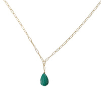 Gold chain necklace with a green malachite teardrop pendant on a white background