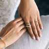 woman wearing solid gold stacking rings 
