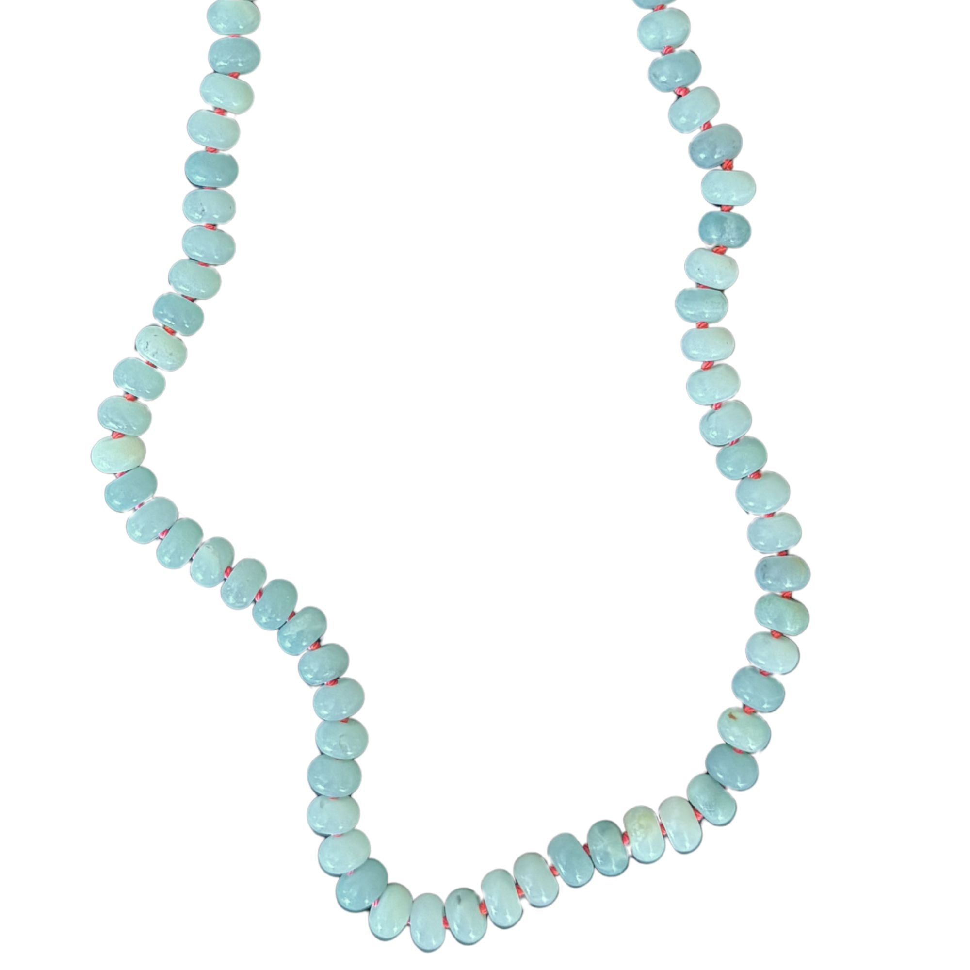 amazonite bead necklace with coral silk on white background