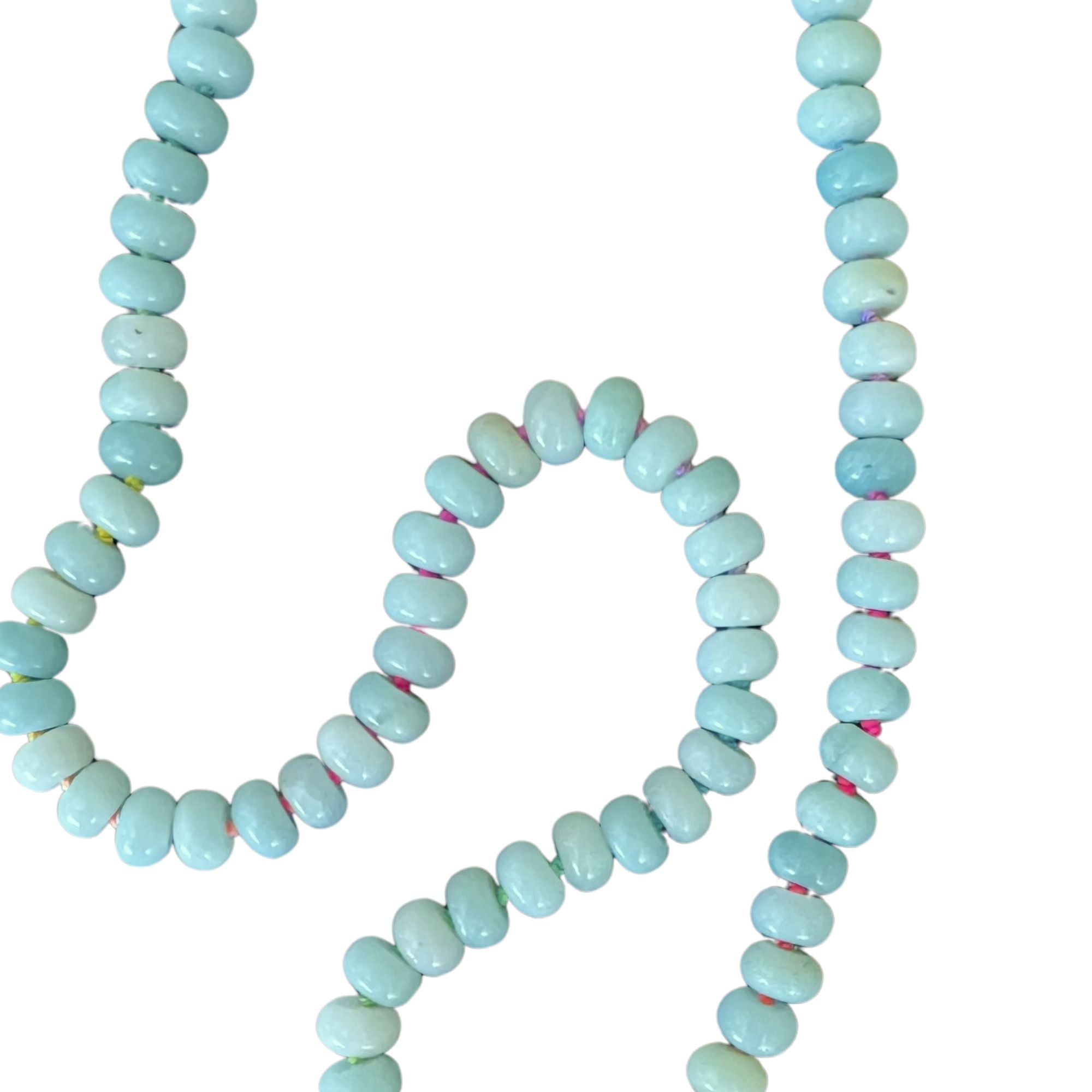 amazonite bead necklace with rainbow silk on white background