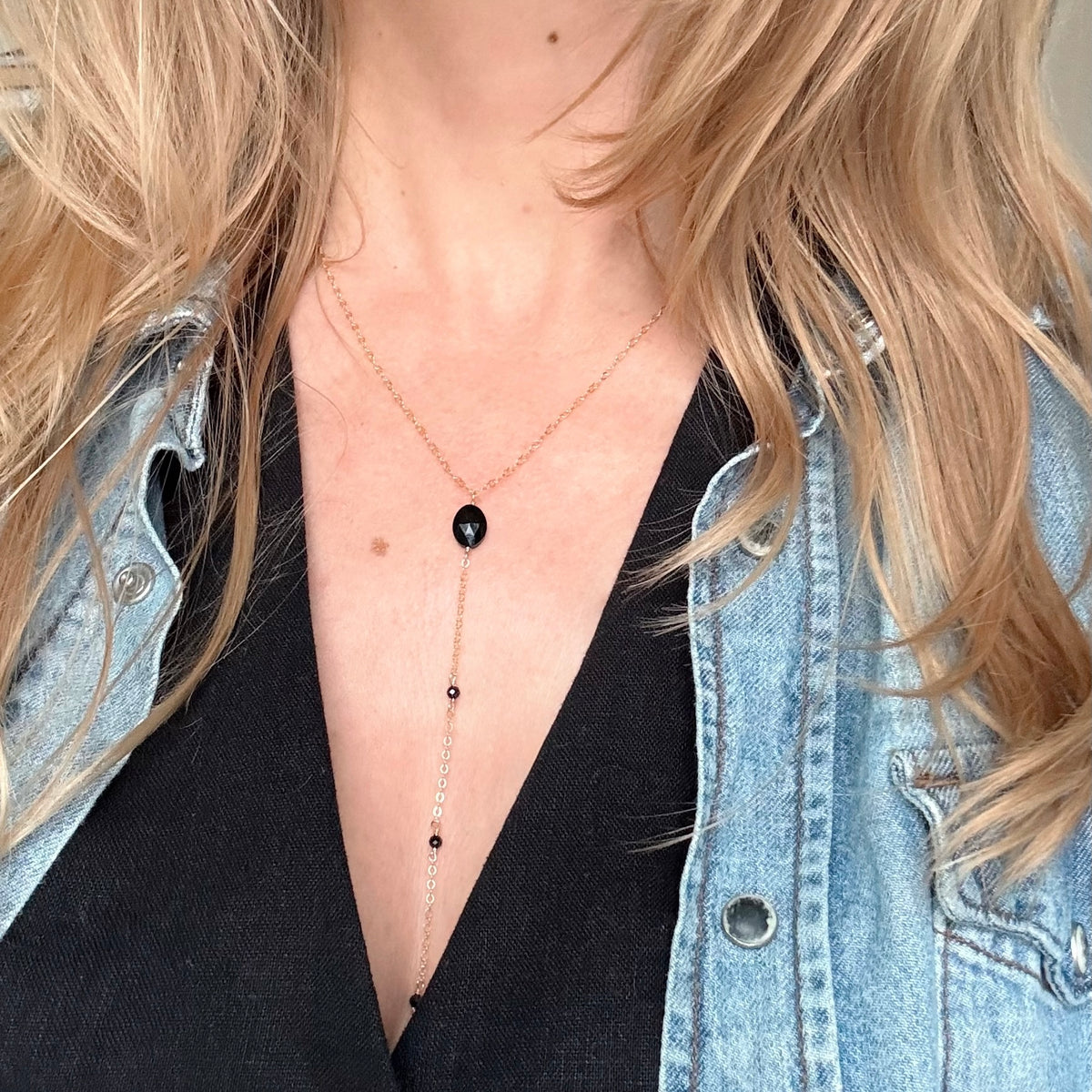 Black onyx chain necklace on woman