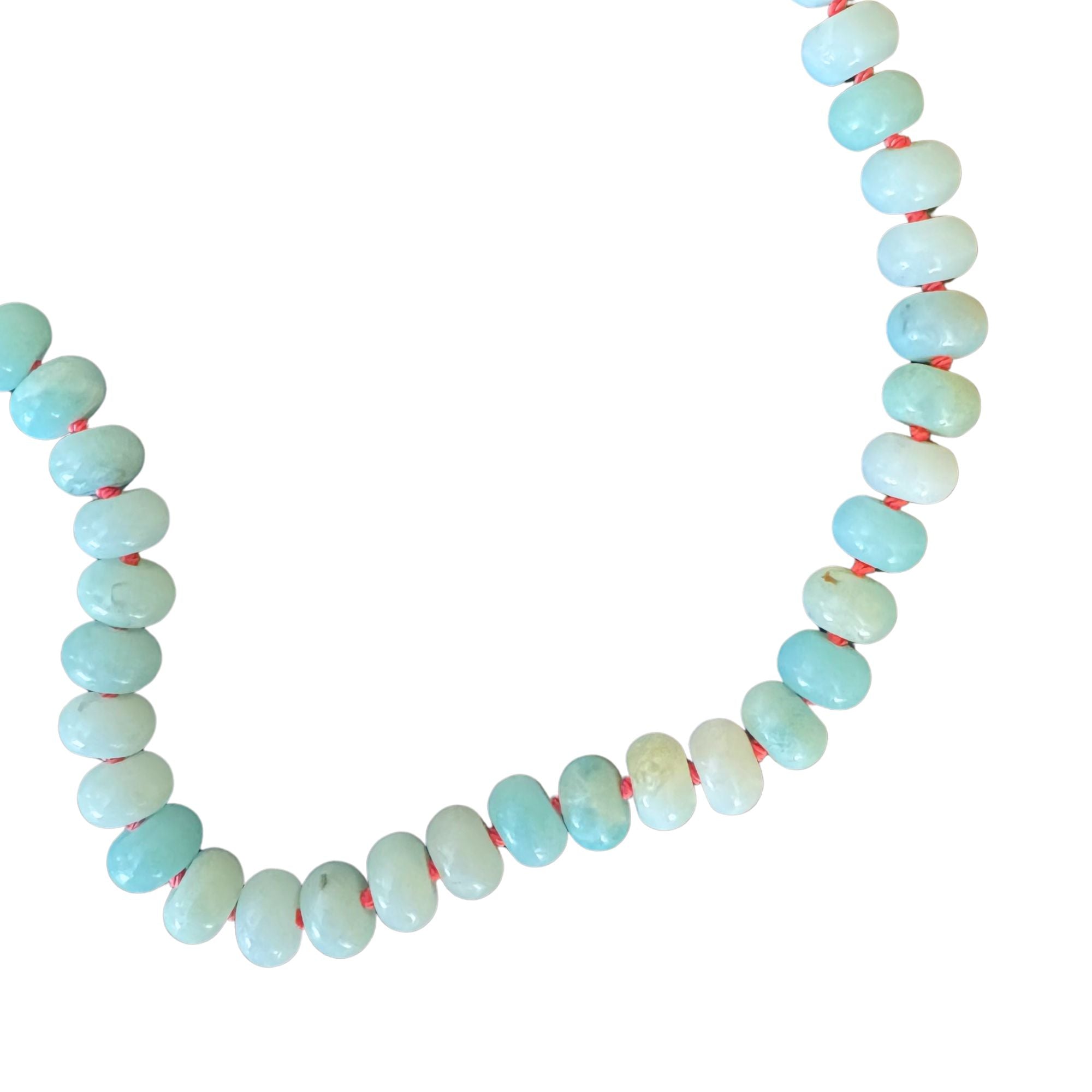 amazonite bead necklace with coral silk on white background