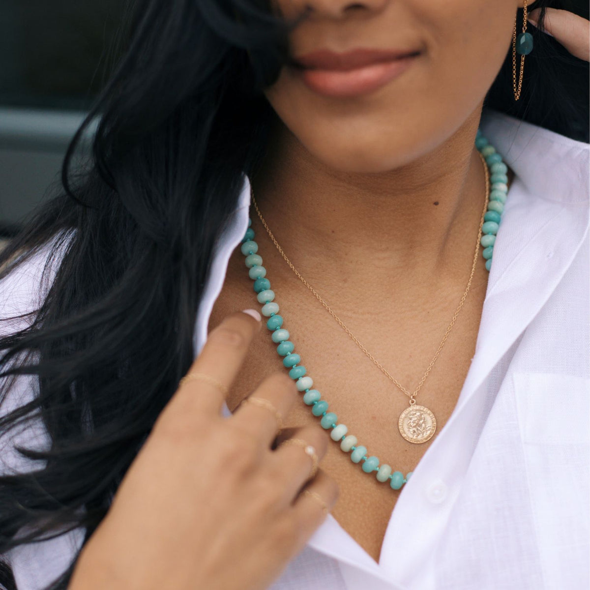 woman wearing hand knotted amazonite bead necklace